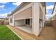 Exterior view of the home's covered patio with backyard and shade at 9947 Fletcher Peak Ave, Las Vegas, NV 89178