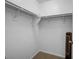 Well-organized walk-in closet with ample shelving for storage solutions at 9947 Fletcher Peak Ave, Las Vegas, NV 89178