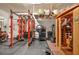 Well-equipped home gym with a weight rack, sauna, and exercise equipment at 9947 Fletcher Peak Ave, Las Vegas, NV 89178