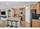 Kitchen featuring a center island with seating and stainless steel appliances at 9947 Fletcher Peak Ave, Las Vegas, NV 89178