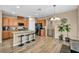 Kitchen with a center island, bar seating, and modern appliances at 9947 Fletcher Peak Ave, Las Vegas, NV 89178