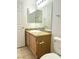 Well-lit bathroom featuring a vanity with granite countertops and a large mirror at 1521 Ruby Cliffs Ln # 104, Las Vegas, NV 89144