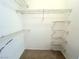 Walk-in closet with metal shelving at 1521 Ruby Cliffs Ln # 104, Las Vegas, NV 89144