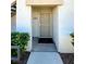 Welcoming front door featuring a security screen, unit number and fresh exterior paint at 1521 Ruby Cliffs Ln # 104, Las Vegas, NV 89144