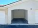 Attached one car garage offering ample space for parking and storage at 1521 Ruby Cliffs Ln # 104, Las Vegas, NV 89144
