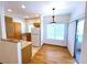 Well-lit kitchen with an adjoining breakfast area, offering ample storage and natural light at 1521 Ruby Cliffs Ln # 104, Las Vegas, NV 89144