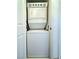Efficient laundry closet with stacked washer and dryer units for space-saving convenience at 1521 Ruby Cliffs Ln # 104, Las Vegas, NV 89144