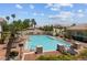 Resort-style community pool and spa area offers residents a place to relax in the sun at 1521 Ruby Cliffs Ln # 104, Las Vegas, NV 89144
