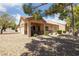 Nice backyard featuring low-maintenance landscaping, a patio, and views of mature trees at 1900 Bellview St, Las Vegas, NV 89134
