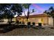 The backyard offers a serene patio area, desert landscaping, and a well-maintained exterior at 1900 Bellview St, Las Vegas, NV 89134
