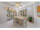 Bright dining area with table, chairs, and sliding glass door leading to an outdoor patio at 1900 Bellview St, Las Vegas, NV 89134