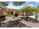 Beautiful single-story home with desert landscaping in the front yard with mature landscaping at 1900 Bellview St, Las Vegas, NV 89134