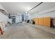 Spacious garage with room for storage, painted walls, and an automatic garage door at 1900 Bellview St, Las Vegas, NV 89134