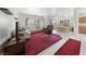 Spacious living room with plush sofas, a large window, and open access to dining area at 1900 Bellview St, Las Vegas, NV 89134