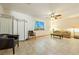 Bright living room with neutral tones, tile floors, and comfortable seating at 2040 Tucuman Ave, Pahrump, NV 89048