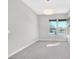 Bright bedroom with neutral walls, plush carpet, base molding and large windows at 2170 Monte Bianco Pl, Henderson, NV 89044