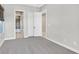 Bedroom with neutral walls, large windows, and nearby access to walk-in closet at 2170 Monte Bianco Pl, Henderson, NV 89044