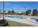 Resort-style pool with comfortable seating and landscaping at 2170 Monte Bianco Pl, Henderson, NV 89044
