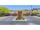 The community entrance has a contemporary sign and welcoming gates at 2170 Monte Bianco Pl, Henderson, NV 89044