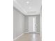 Welcoming foyer with tiled floors, neutral walls, and a modern front door with glass panel at 2170 Monte Bianco Pl, Henderson, NV 89044