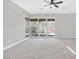 Carpeted main bedroom with large windows for ample natural light and ceiling fan at 2170 Monte Bianco Pl, Henderson, NV 89044