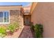 Inviting front entrance featuring a charming walkway and lush landscaping at 2398 Jada Dr, Henderson, NV 89044