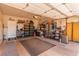 Spacious garage with built-in storage cabinets and plenty of room for parking at 2398 Jada Dr, Henderson, NV 89044
