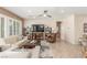 Bright living room featuring a comfortable seating area and large windows at 2398 Jada Dr, Henderson, NV 89044