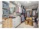 Walk-in closet featuring organized storage, built-in shelves, and a skylight above at 2398 Jada Dr, Henderson, NV 89044