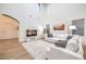 Bright and spacious living room with high ceilings, a plush sofa, and large windows at 2571 Red Springs Dr, Las Vegas, NV 89135