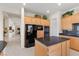 Modern kitchen with stainless steel appliances, granite countertops, and ample cabinetry, providing a seamless cooking experience at 3048 Red Arrow Dr, Las Vegas, NV 89135