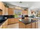 Bright kitchen featuring granite countertops, modern appliances, and ample cabinet space, providing a delightful cooking experience at 3048 Red Arrow Dr, Las Vegas, NV 89135