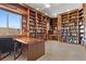 Spacious library with floor to ceiling bookshelves and built-in desk at 3048 Red Arrow Dr, Las Vegas, NV 89135