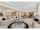 Expansive living area boasts elegant furnishings and seamless transition to other living spaces at 3048 Red Arrow Dr, Las Vegas, NV 89135