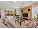 Living room featuring an open-concept design, seamlessly connecting the kitchen and seating area, perfect for entertaining at 3048 Red Arrow Dr, Las Vegas, NV 89135