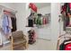 A tidy walk-in closet with shelves, hanging space, and drawers for optimal organization at 3048 Red Arrow Dr, Las Vegas, NV 89135