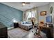 Cozy bedroom with custom wall design and gray wood look floors at 333 Mandarin Hill Ln, Henderson, NV 89012