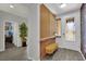 Inviting foyer features modern decor, accent wall, and bench seating at 333 Mandarin Hill Ln, Henderson, NV 89012