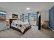 Spacious main bedroom features large windows with bright natural light and a cozy reading nook at 333 Mandarin Hill Ln, Henderson, NV 89012