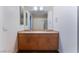 Bathroom featuring double sinks, a granite countertop, and modern cabinetry at 353 E Bonneville Ave # 711, Las Vegas, NV 89101