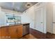 Well-lit kitchen with stainless steel dishwasher and granite counters at 353 E Bonneville Ave # 711, Las Vegas, NV 89101