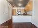 Bright kitchen with stainless steel appliances, wood floors, and ample counter space at 353 E Bonneville Ave # 711, Las Vegas, NV 89101
