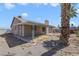 Backyard view with covered patio and desert landscaping at 364 Dooley Dr, Henderson, NV 89015