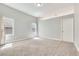 Spacious bedroom with neutral carpeting, bright windows and white trim at 364 Dooley Dr, Henderson, NV 89015