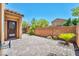 Backyard with brick fence, interlock patio and minimal landscaping at 3757 Via Geneva, Henderson, NV 89052