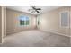 Spacious primary bedroom featuring neutral paint, carpet and bright light at 3757 Via Geneva, Henderson, NV 89052