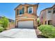 Charming two-story home with a two-car garage, desert landscaping, and striking curb appeal at 3757 Via Geneva, Henderson, NV 89052