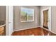 Eat in kitchen featuring wood floors, bright light and an exterior door at 3757 Via Geneva, Henderson, NV 89052