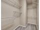 Organized walk-in closet with wire shelving, providing ample storage space at 3757 Via Geneva, Henderson, NV 89052