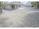 Low maintenance backyard with white gravel throughout at 4269 Roanridge Ave, Las Vegas, NV 89120